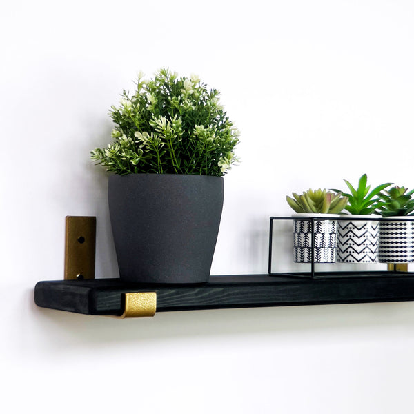 black & gold shelf with J style brackets