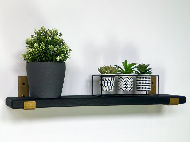 black & gold shelf with J style brackets